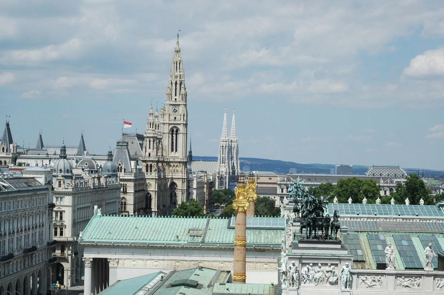 Vienna — historic skyline with the Rathaus and Votivkirche