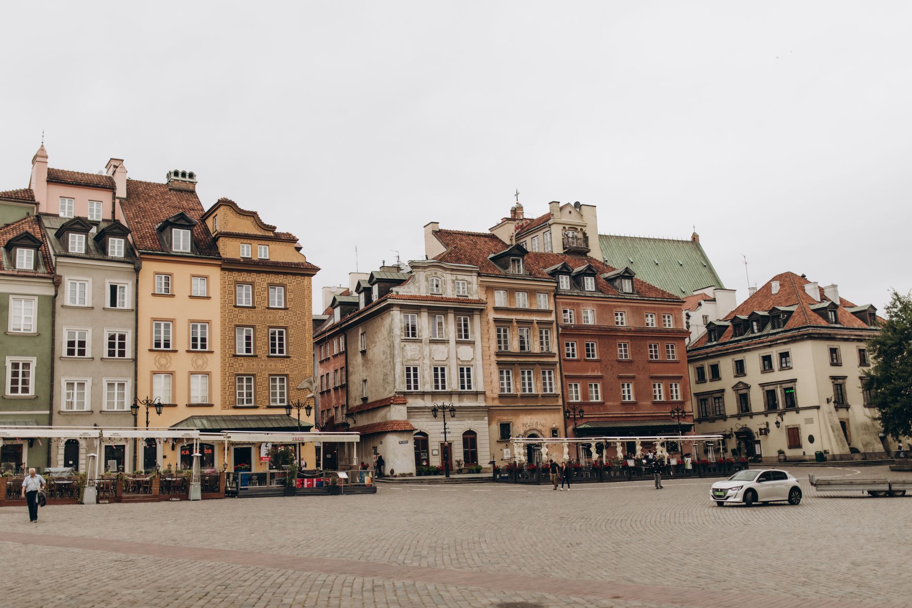 Warsaw, Poland — old town market square and city skyline