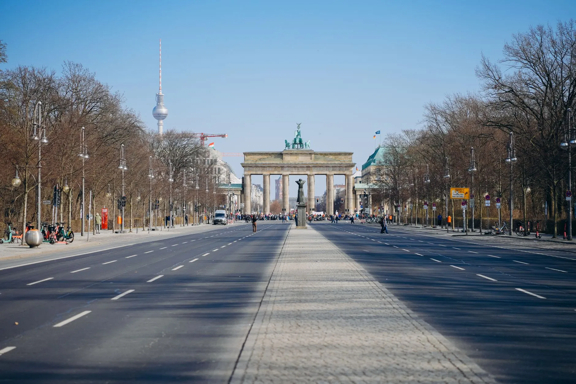 Berlin, Germany — the Brandenburg Gate and the TV Tower from Strasse des 17. Juni