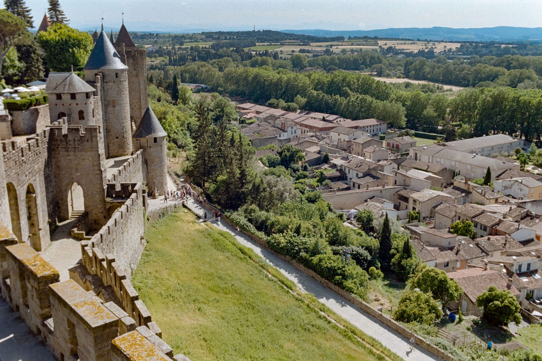 Carcassonne, France — Explore the stunning medieval fortress of Carcassonne, France, from above, showcasing its historic architecture and surrounding landscape.