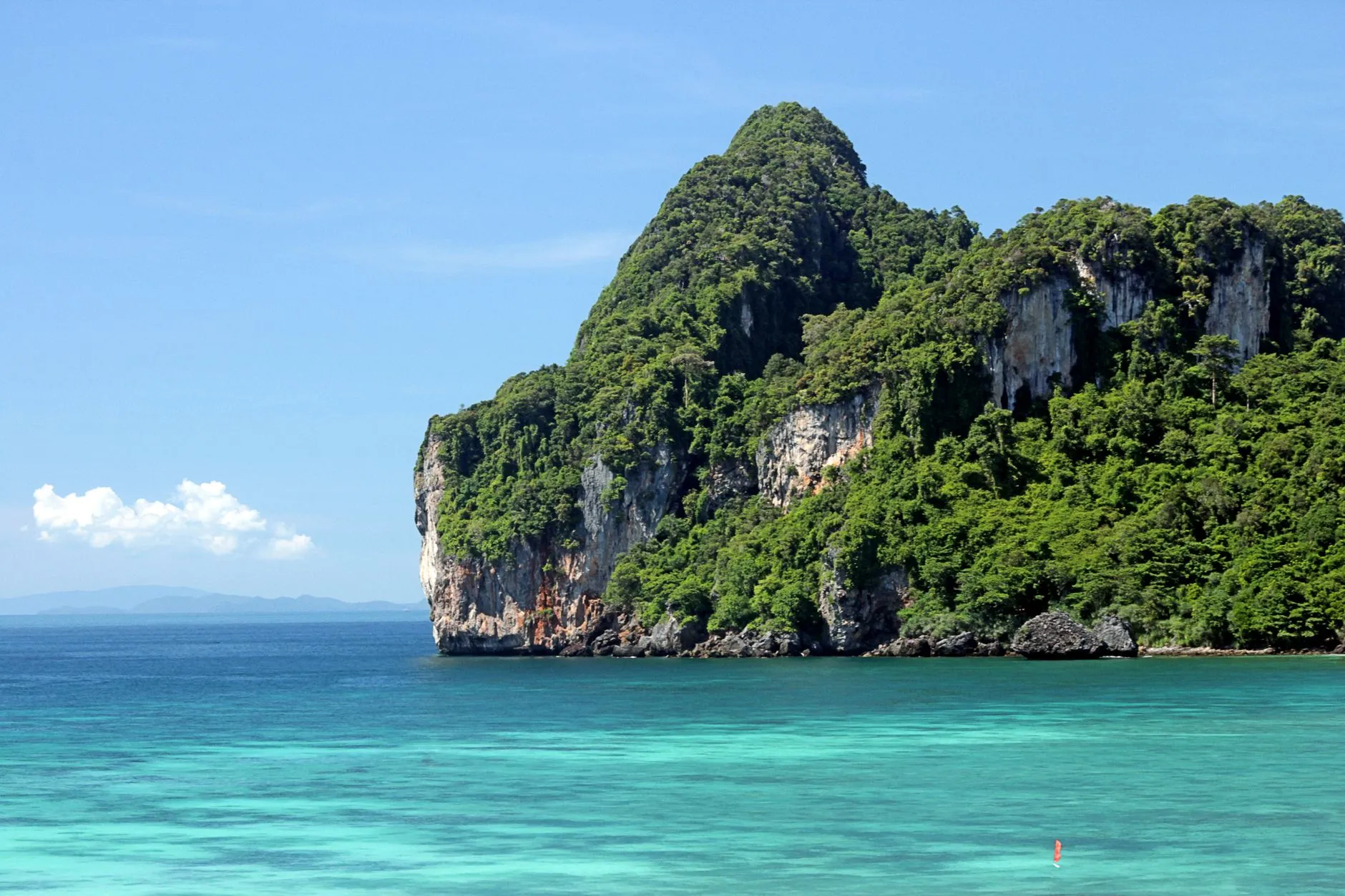 Limestone karst and turquoise water, Andaman Sea coast — southern Thailand