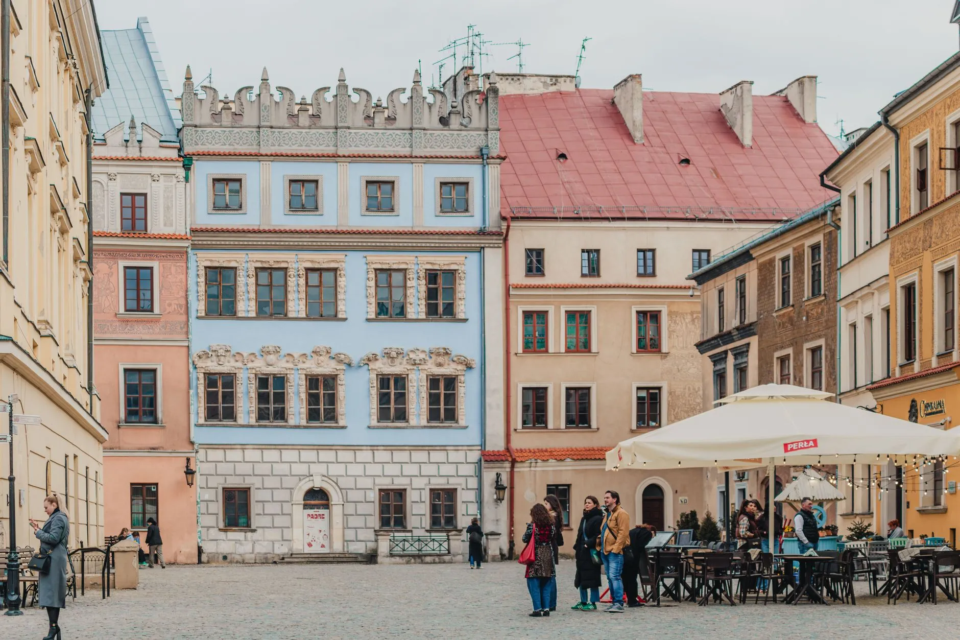 Lublin, Poland — Picturesque square with colorful historic buildings and outdoor cafes in Lublin's Old Town.