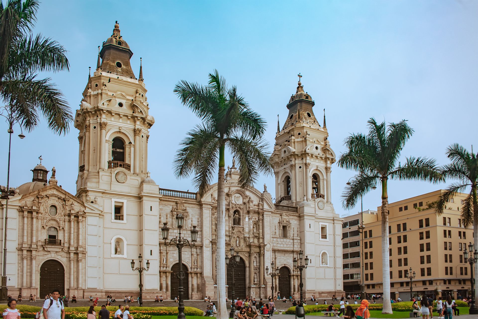 Lima Cathedral in Plaza Mayor, Lima, Peru, under a clear blue sky.