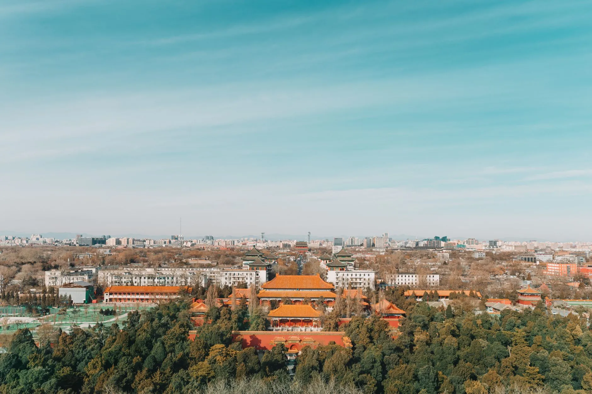 Beijing, China — the Forbidden City's golden roofs from Jingshan, with the city beyond