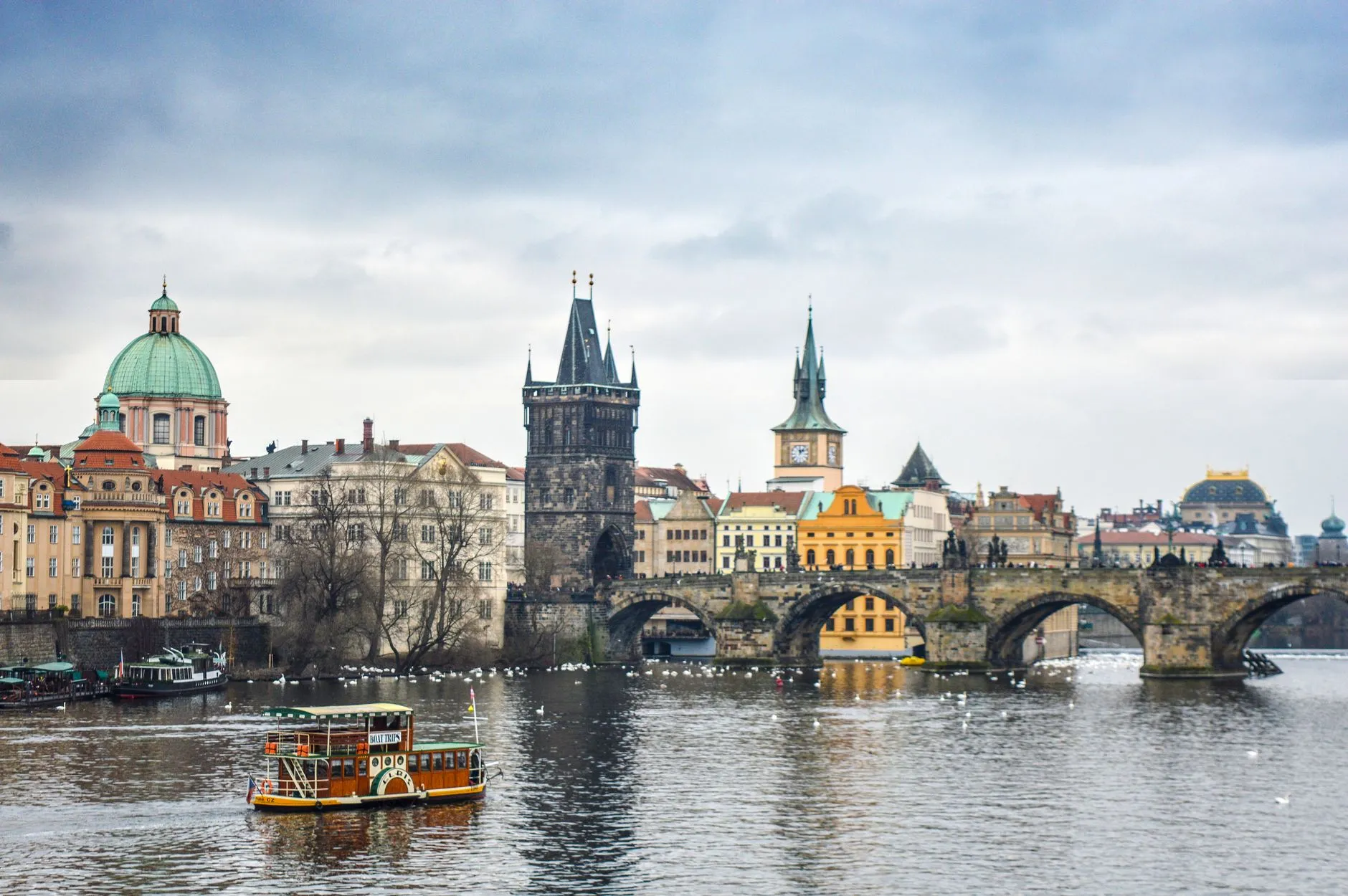 Prague, Czechia — Charles Bridge and the Old Town Bridge Tower over the Vltava
