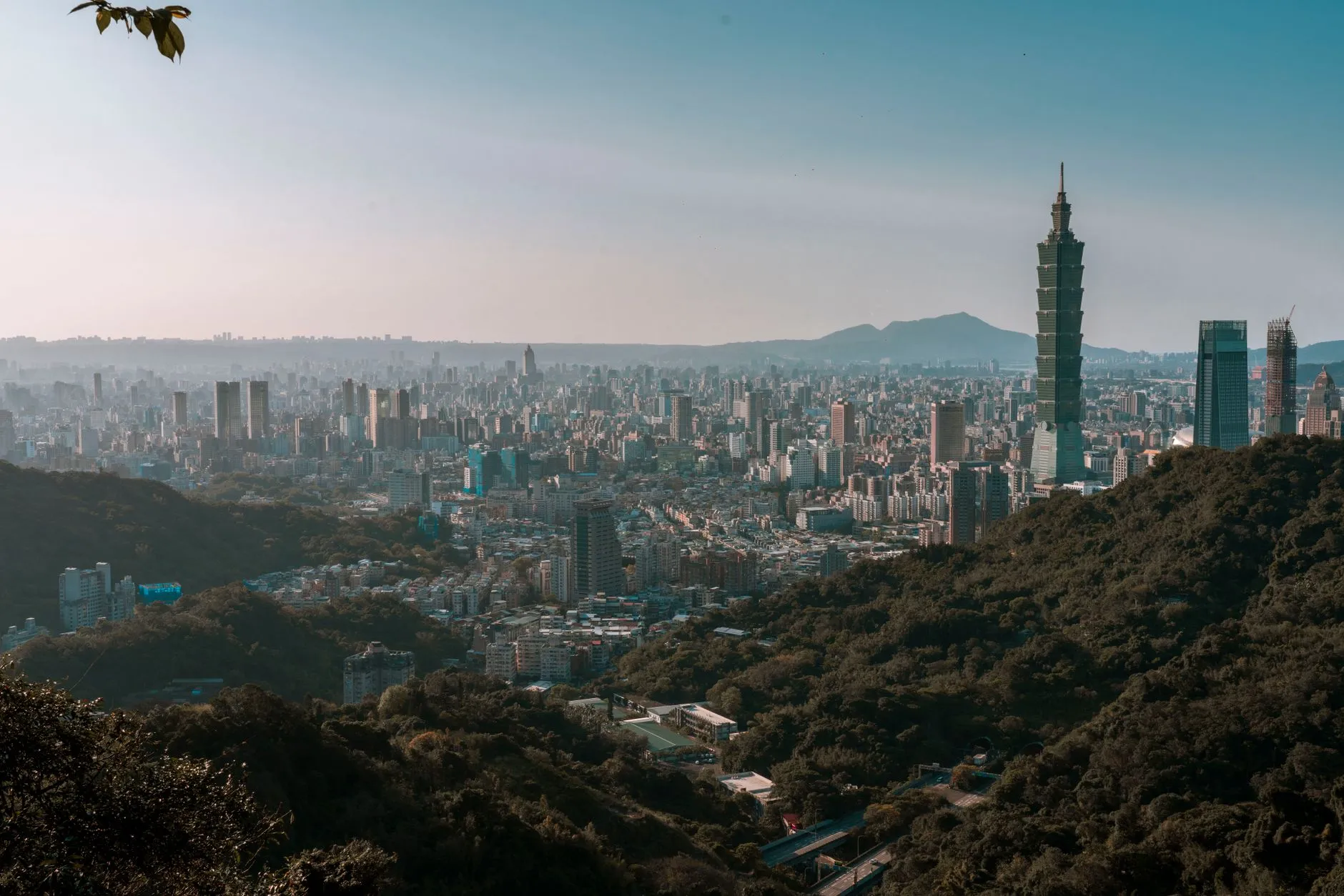 Taipei, Taiwan — a breathtaking aerial view of taipei's skyline featuring the iconic taipei 101 skyscraper.