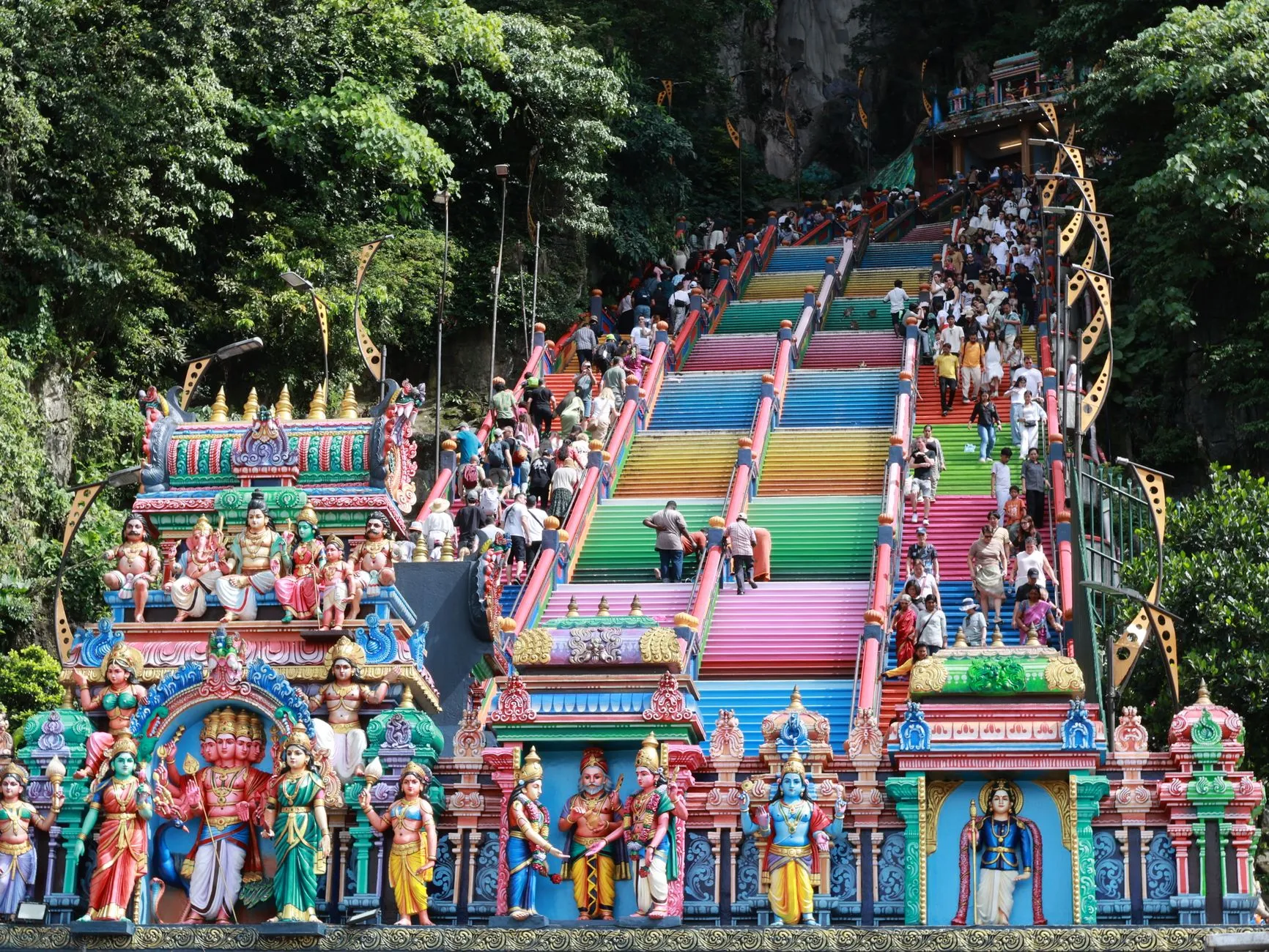 Kuala Lumpur, Malaysia — the rainbow staircase and painted temple gateway at Batu Caves